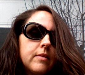 Yes, it is me. The only picture of me you'll ever see on this blog. Sitting in the sun on a February afternoon during naptime.